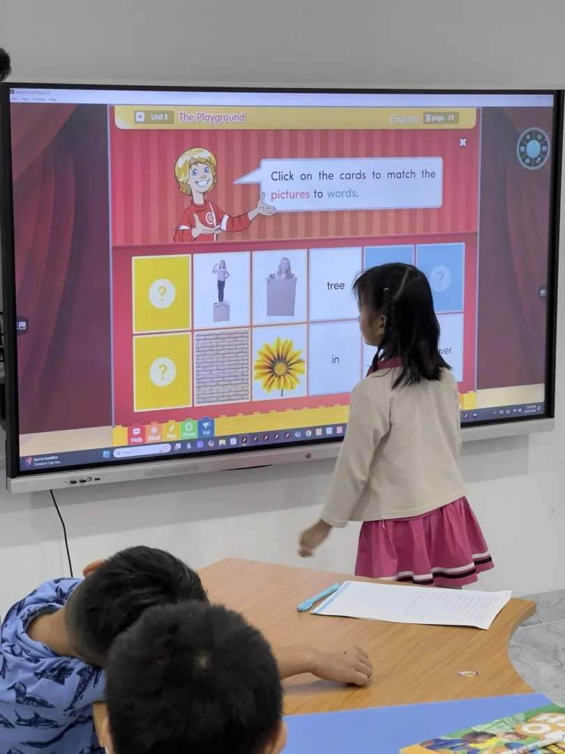 Teacher celebrating a correct answer with a high-five